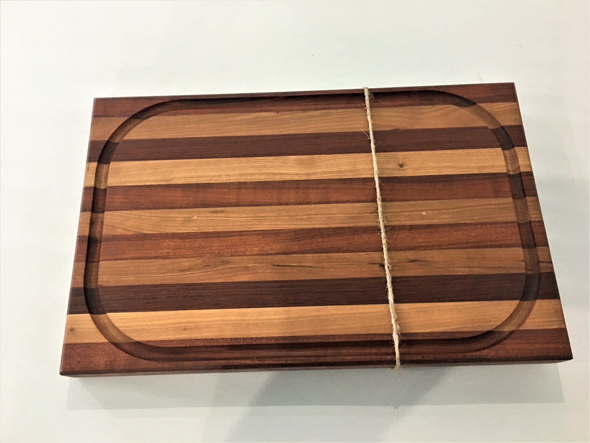 Hiawatha WoodWorks Large Wood Fiber Cutting Board with Juice Groove (D –  Peace Marketplace